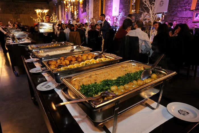 Buffet line at an evening event