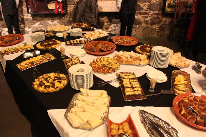 Table with desserts and savoury snacks